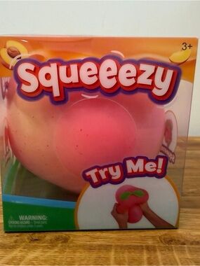 NWT Sunny Days Squeeezy Peach Squishy Large (2 available)